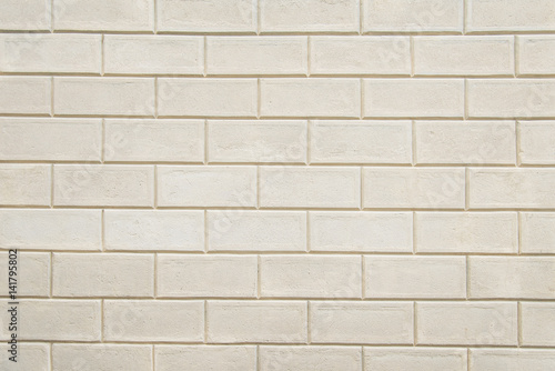 Old beige stone wall background