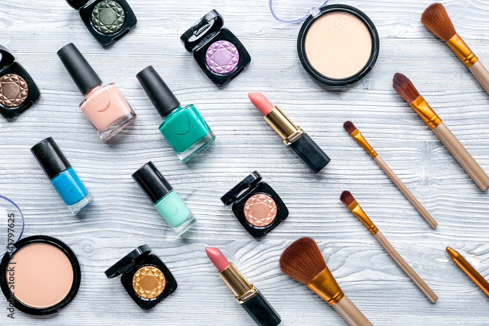 cosmetic set with eye shadow on woman table background top view cosmetic set with eye shadow on woman table background top view