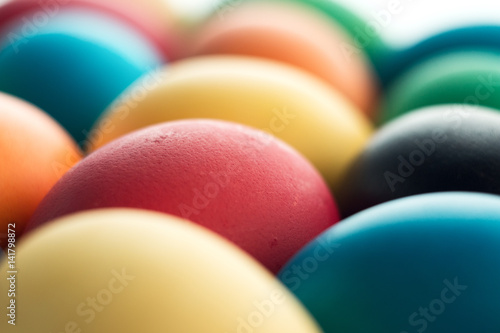 Colorful Easter eggs close-up macro. The concept of a holiday and a happy Easter.
