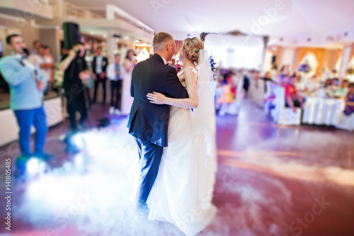 Amazing first wedding dance with fog smoke at dancefloor and various lights.