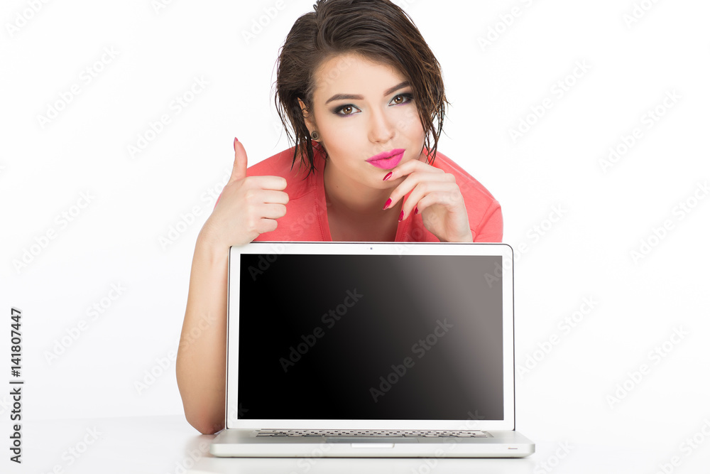 Women behind laptop with like thumb Women behind laptop with like thumb