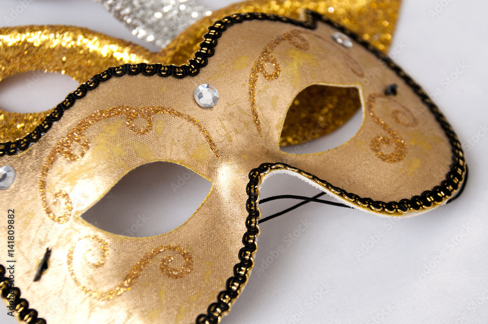Carnival masks on a light background. Theatre day