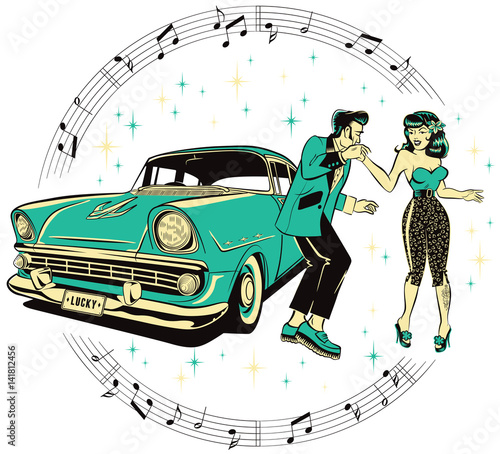 Teddyboy and a rockabilly pinup chick dancing in front of a hotrod isolated on a white background photo