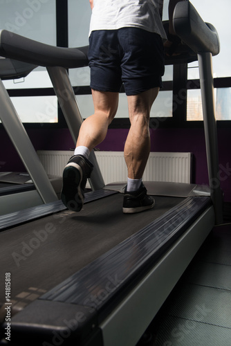Man Feet On Treadmill