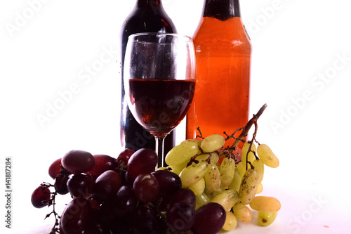 Glass of wine on white background