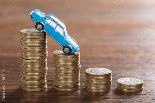 Car Model Over A Stacked Coin
