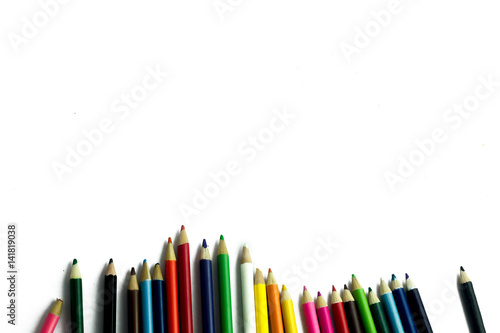 Color pencil with copy space isolated on whtie background,education frame concept.Colored pencil on paper drawing white.