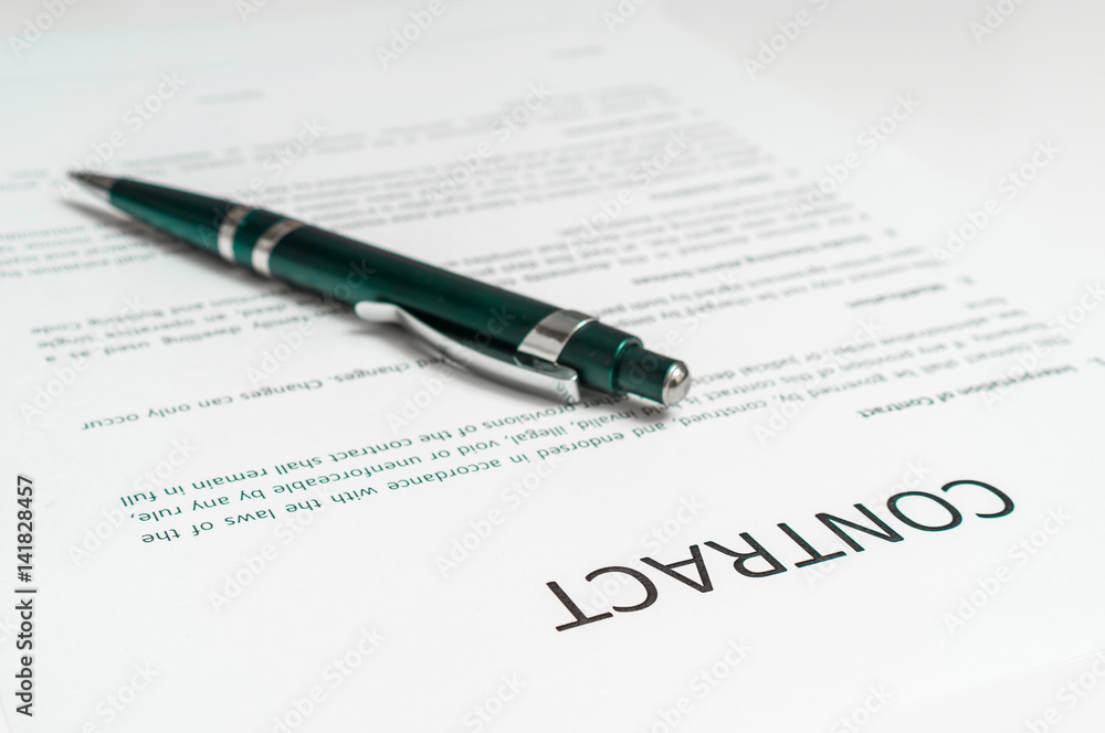 Close-up of ballpoint pen on contract Close-up of ballpoint pen on contract
