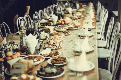 Table served with food and drink