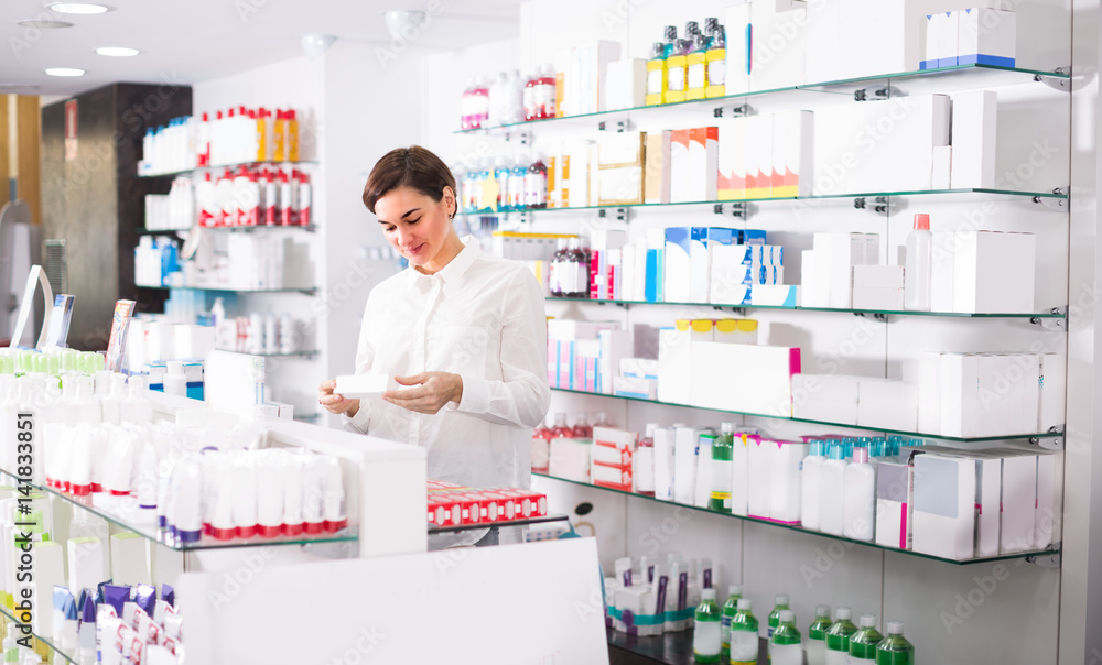 Woman is browsing rows of body care products