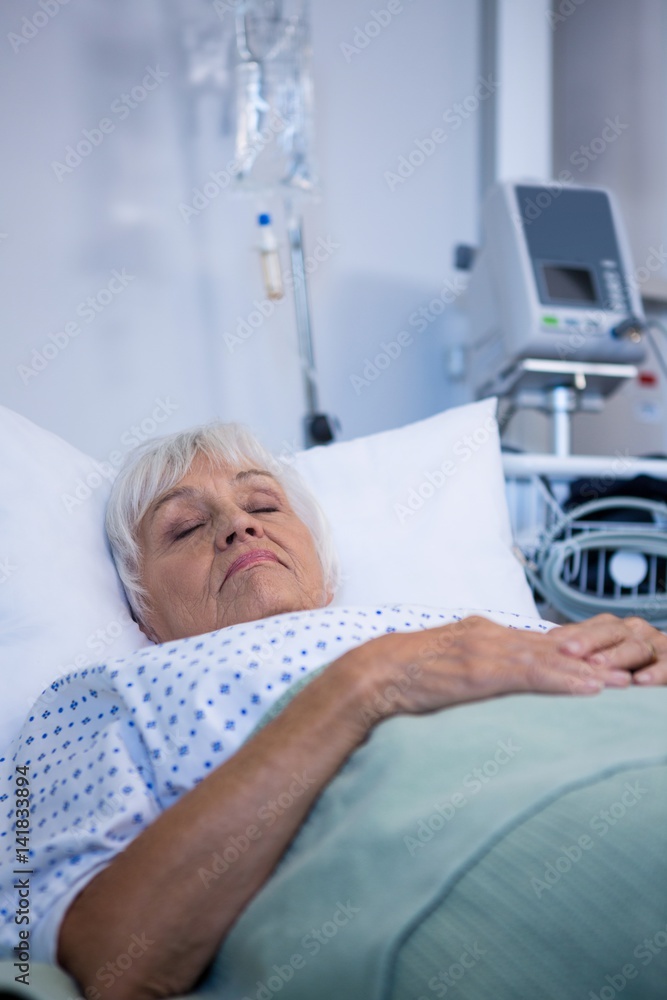 Senior patient lying on bed Senior patient lying on bed
