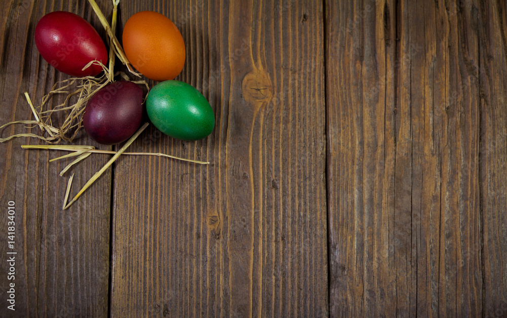 Easter colorful eggs on a wooden base Easter colorful eggs on a wooden base