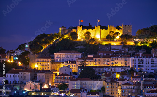 View of Lisbon in the night with St Jorge Castle