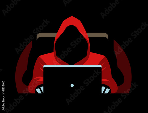 dark faceless hacker using a computer