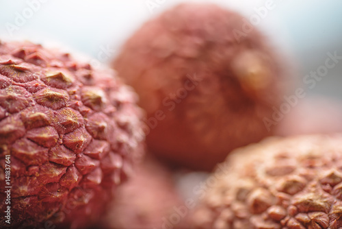 Lichee on wooden table, litchi, lychee fruit detail