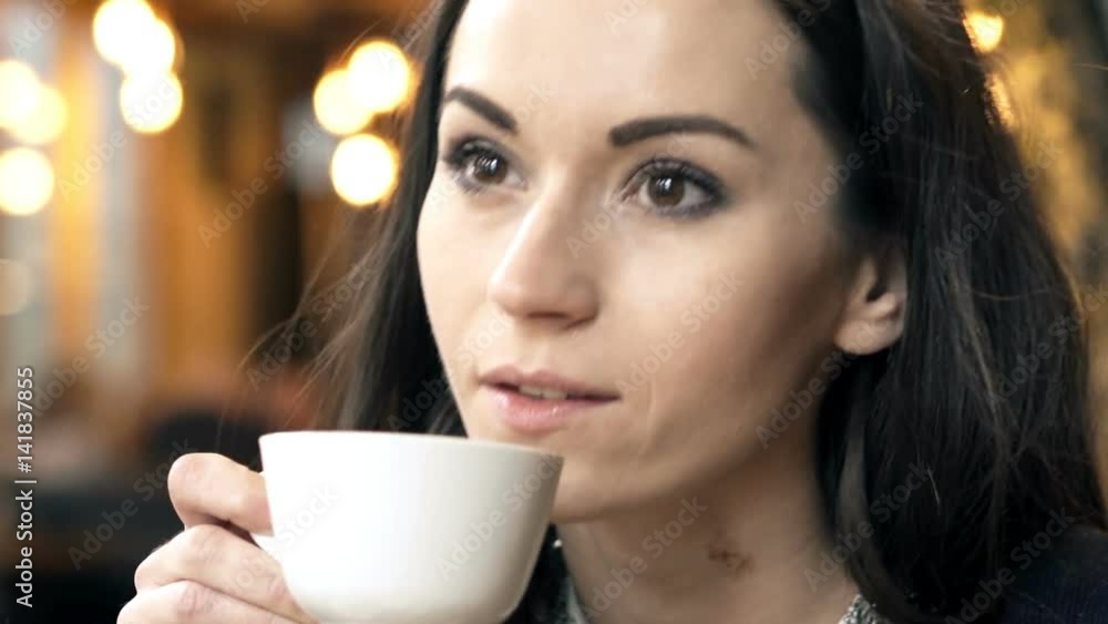 custom made wallpaper toronto digitalYoung, elegant woman relaxing and drinking coffee in cafe