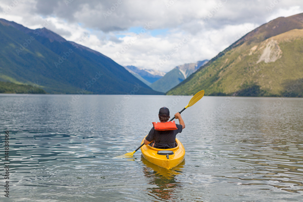 Man paddling kayak in mountain lake, Lake Rotoiti, New Zealand
Man paddling kayak in mountain lake, Lake Rotoiti, New Zealand