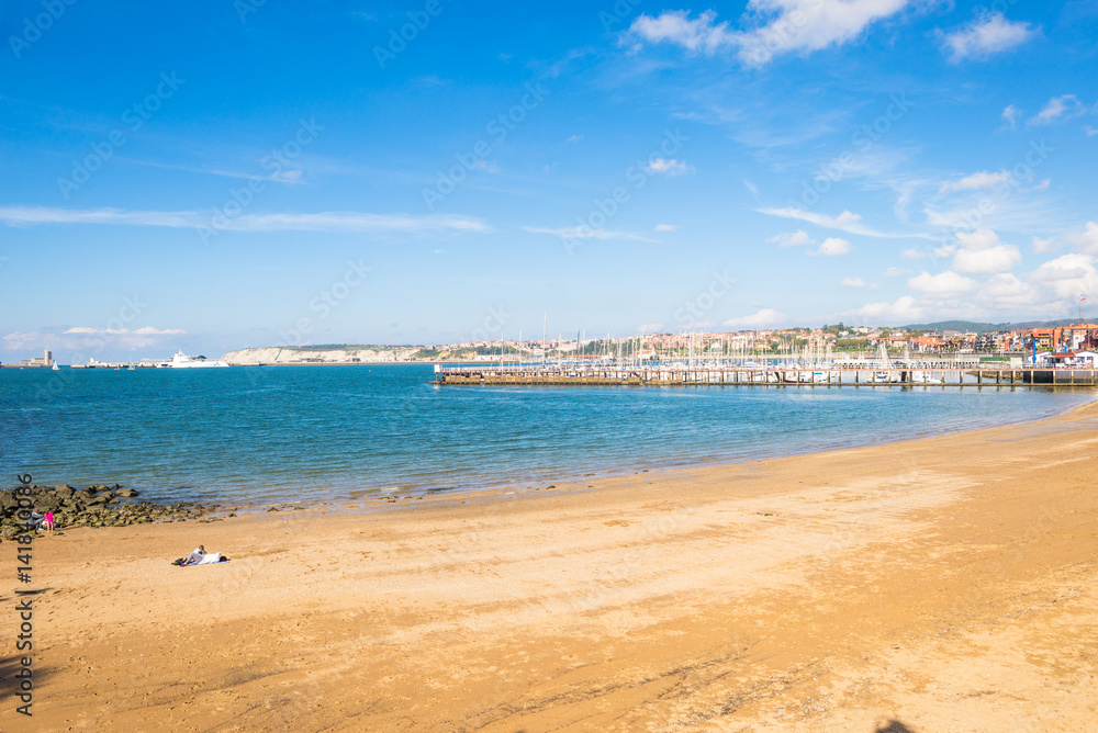 The beach and the marina of the town Las Arenas. The Playa de Las Arenas is situated in the estuary of Bilbao, the river Nervion, the Ria del Bilbao