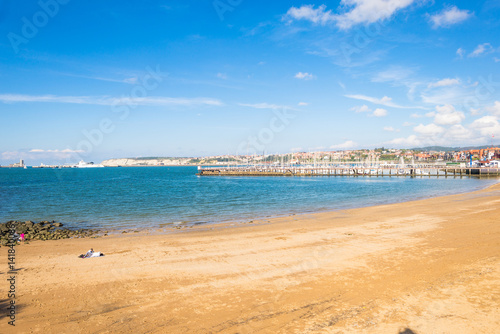 The beach and the marina of the town Las Arenas. The Playa de Las Arenas is situated in the estuary of Bilbao, the river Nervion, the Ria del Bilbao