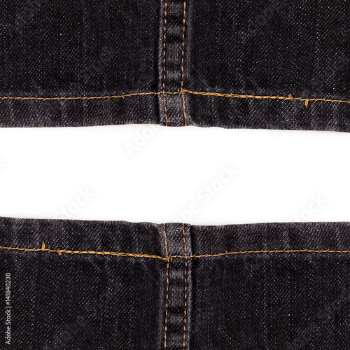 stitches on dark jeans background. Texture of jeans on white color background with clipping path photo