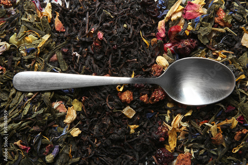 teaspoon and  herbal tea photo