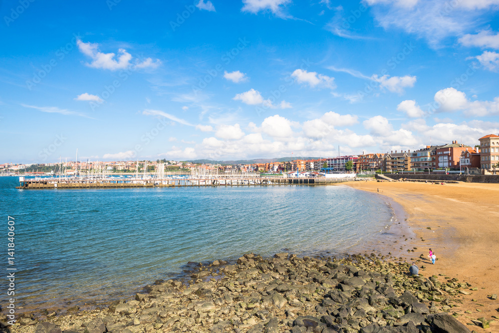 The beach and the marina of the town Las Arenas. The Playa de Las Arenas is situated in the estuary of Bilbao, the river Nervion, the Ria del Bilbao