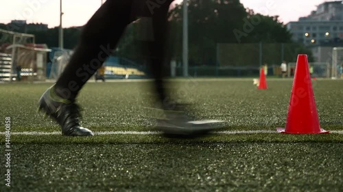 Cone markers for american football. Smooth and slow slider shot photo