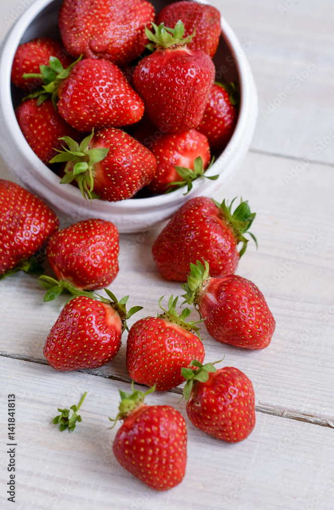 fresh sweet strawberry in the bowl on wooden background fresh sweet strawberry in the bowl on wooden background