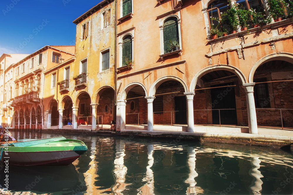 Gondolas on canal in Venice. Venice is a popular tourist destination of Europe.