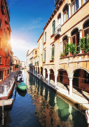 Gondolas on canal in Venice. Venice is a popular tourist destination of Europe.