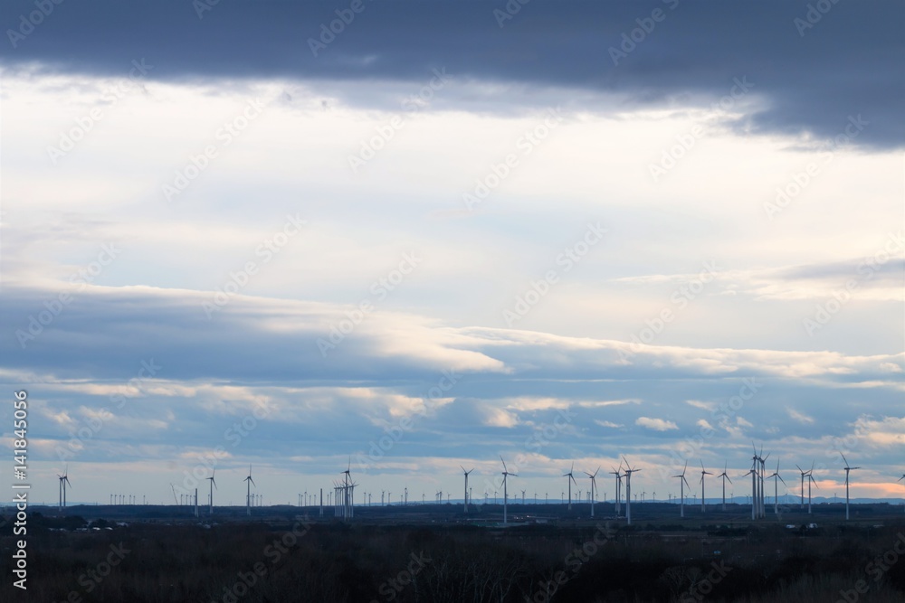 Bratislava, Slovakia - March 19, 2017: Wind turbines in Bratislava. A wind turbine is a device that converts the wind's kinetic energy into electrical power