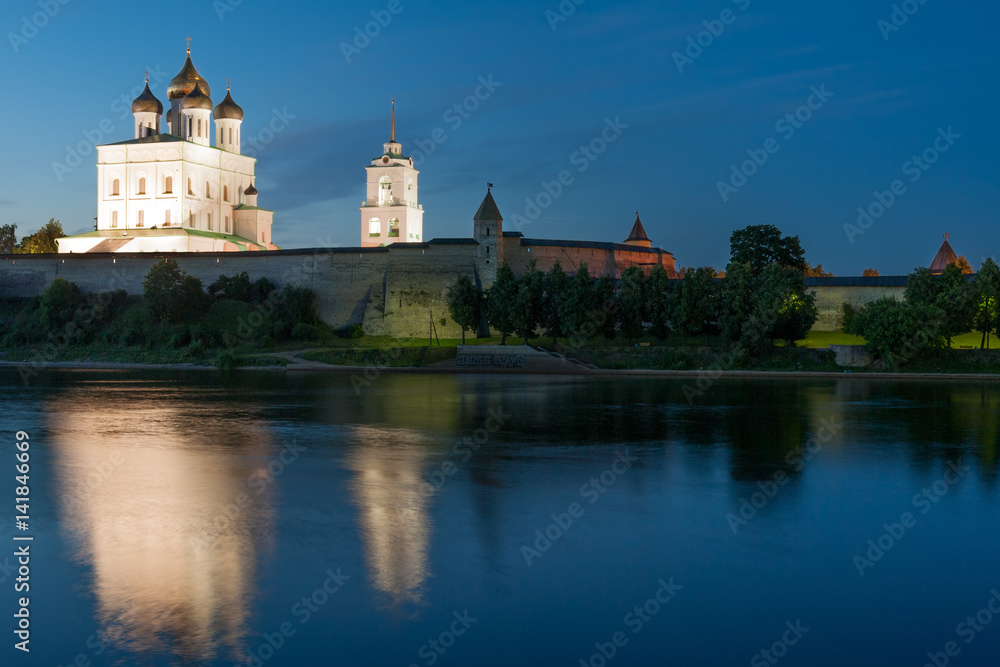 Ancient Pskov Kremlin and river Velikaya at twilight, Russia