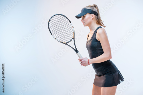 woman with tennis racket