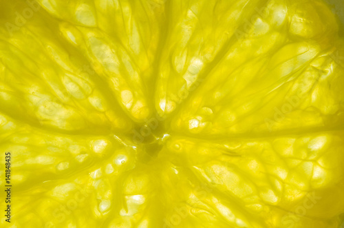 Extreme closeup of a Orange Fruit. Abstract background.