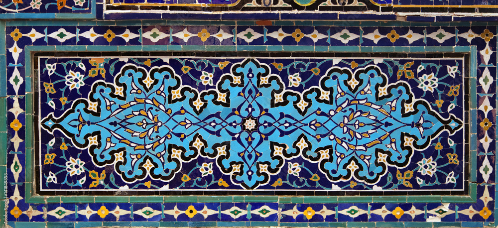 Old Eastern mosaic on the wall, Uzbekistan Old Eastern mosaic on the wall, Uzbekistan