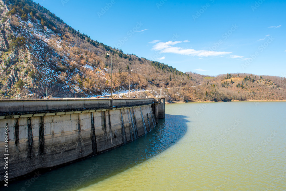 Hydroelectric dam in lake Plastira in the Winter. Central Greece.