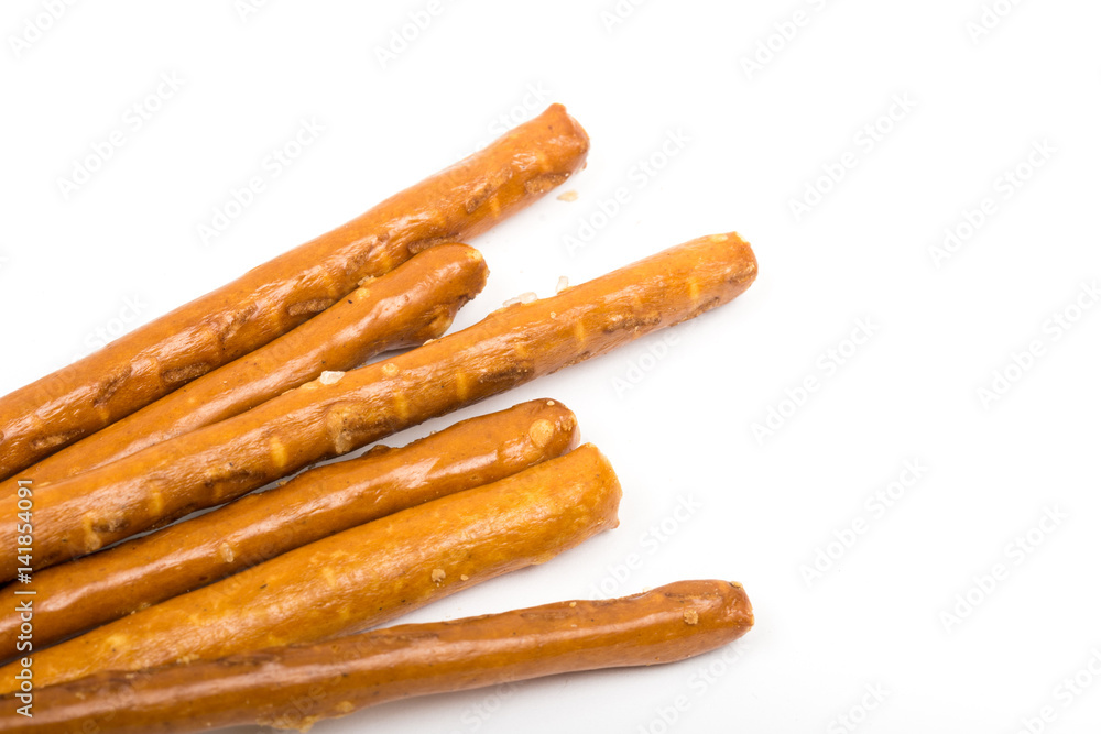 Closeup macro of baked grissini with copy space over white background Closeup macro of baked grissini with copy space over white background