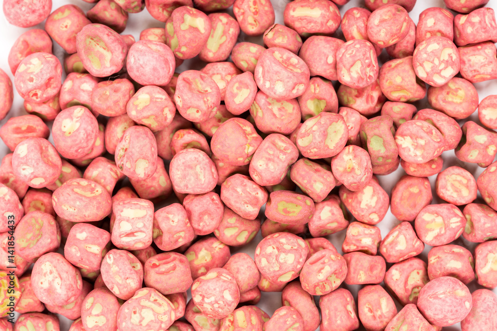Red hybrid pea seeds for planting over white background Red hybrid pea seeds for planting over white background