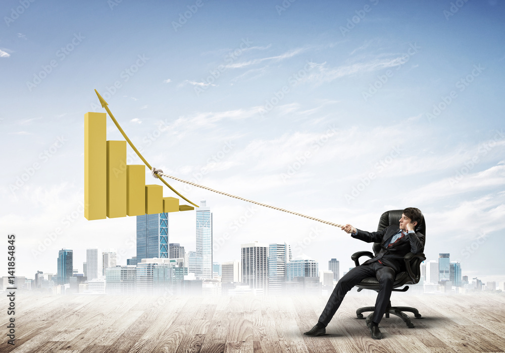 Man pulling with effort big pulling rope graph, as a symbol of financial growth Man pulling with effort big pulling rope graph, as a symbol of financial growth