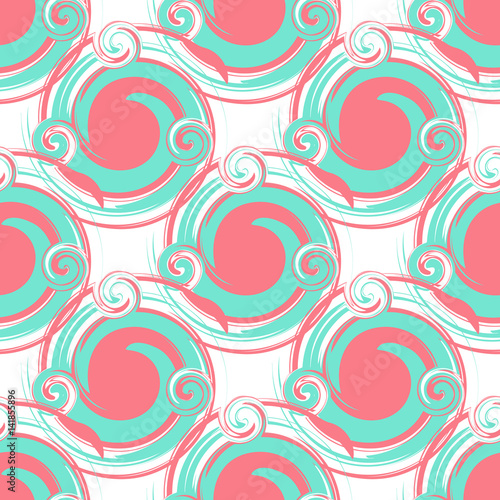 Seamless abstract pattern from large round elements of turquoise and pink. Modern pattern for wallpaper or textile.