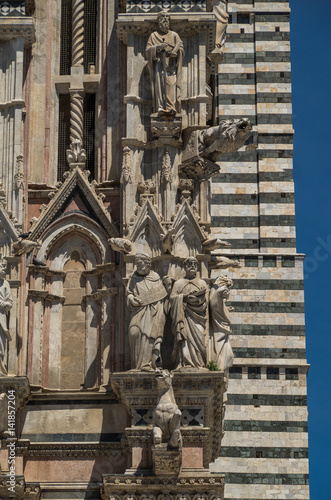 Siena Cathedral is a medieval structure completed in the 13 century and is currently dedicated to the Assumption of Mary