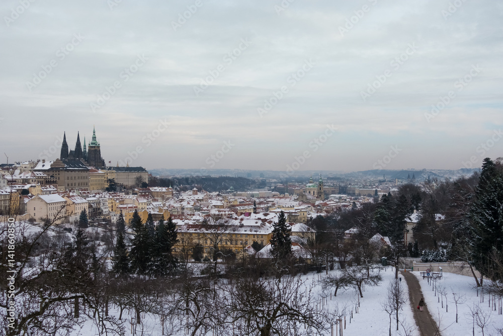View of Prague and its Castle under the snow in winter