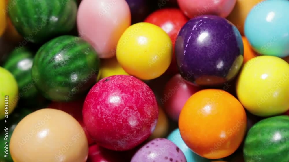 Multi-colored sweets, lollipops and chewing gum. video rotation Multi-colored sweets, lollipops and chewing gum. video rotation