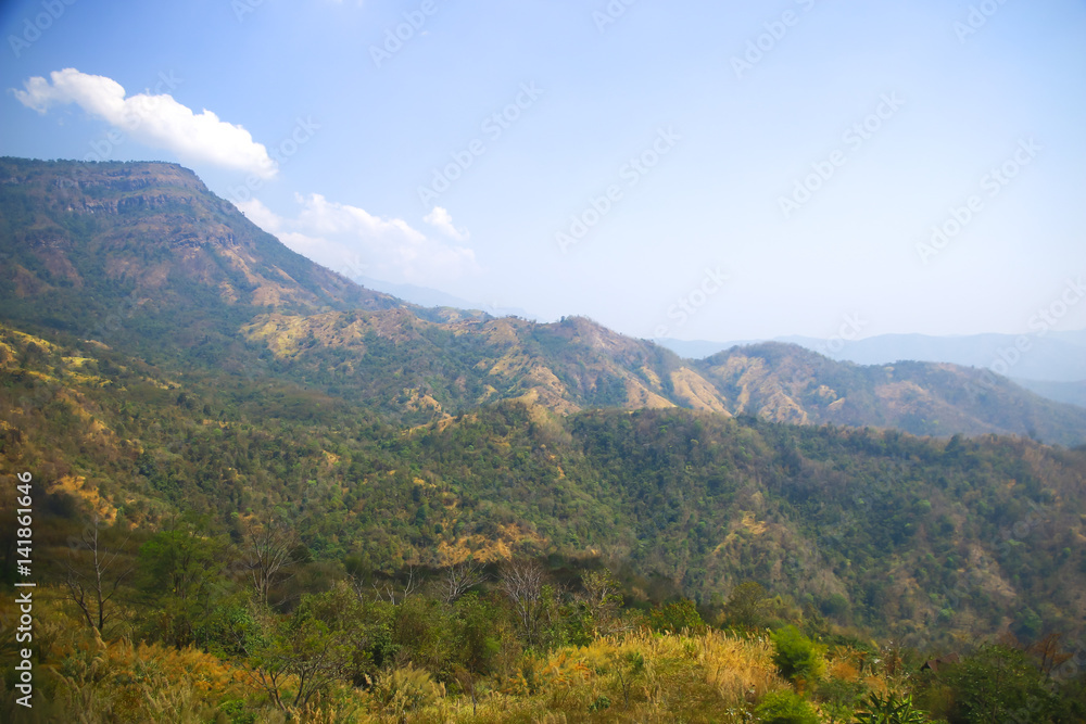 Stock Photo - mountain under the clear sky Stock Photo - mountain under the clear sky