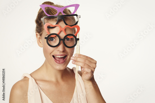 Beautiful woman wearing pairs of spectacles  portrait