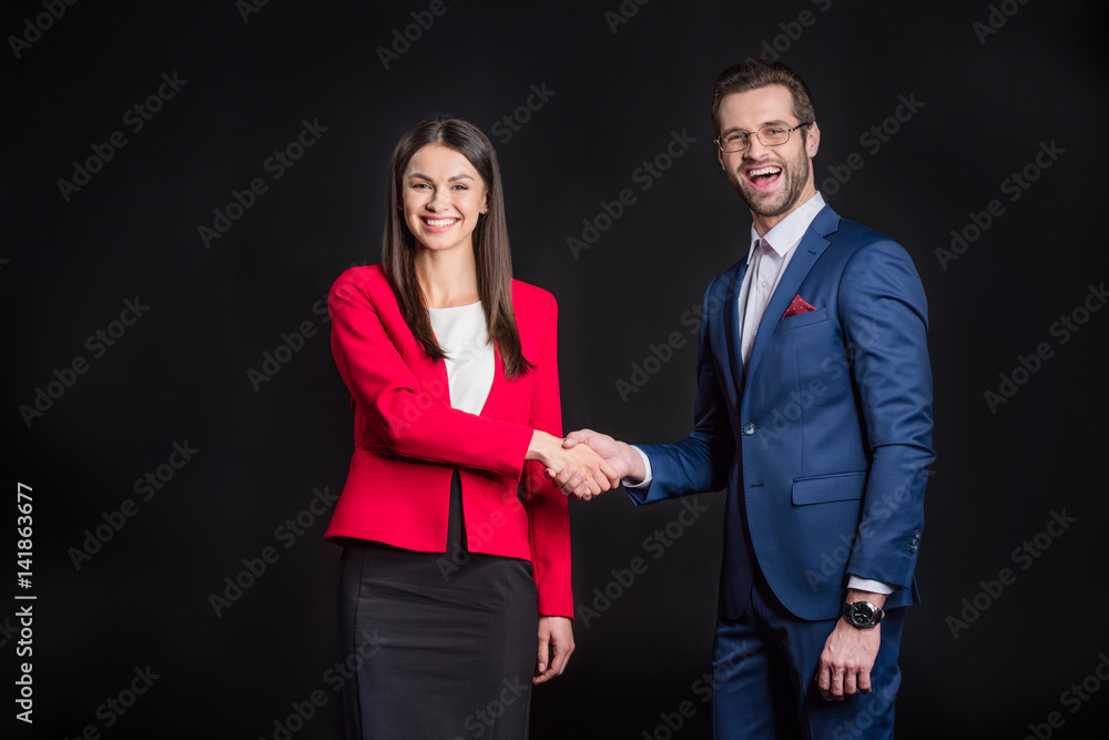Man and woman shaking hands Man and woman shaking hands