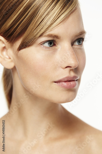 Blue eyed blond woman in close up