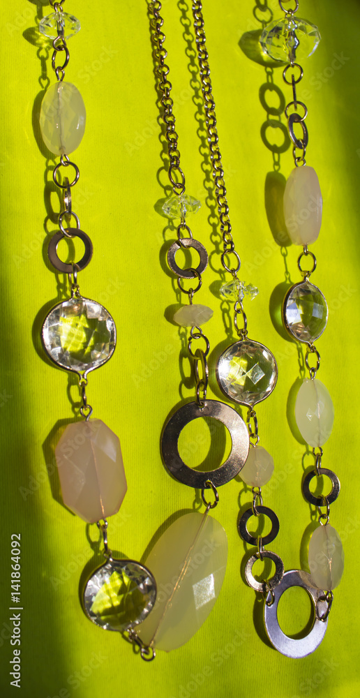 Beads on a light green background Beads on a light green background