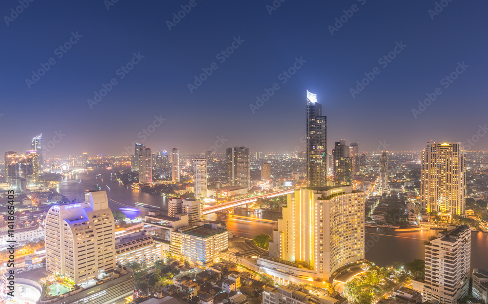 Fototapeta premium Aerial view cityscape and Chaophraya river in Bangkok, Thailand.