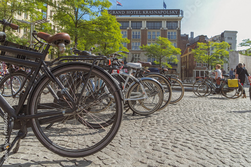 Canvas Print Amsterdam / Holland - 9/12/14 View of amsterdam square with bikes and hotel